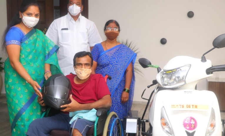 Kavitha gifts a Scooty to disabled engineer